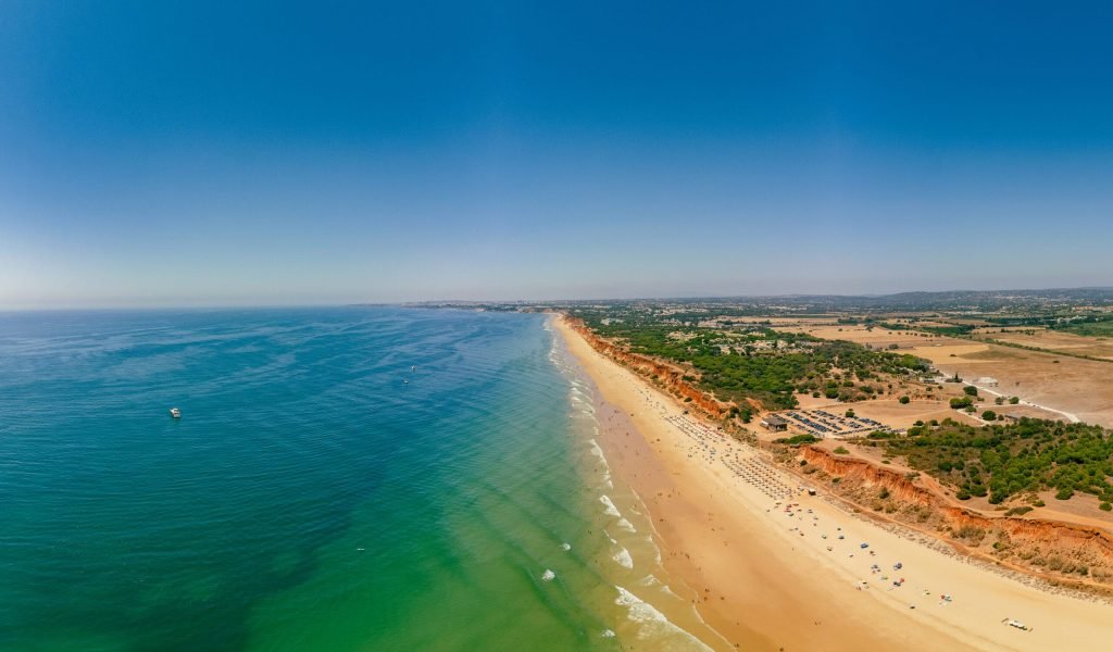 Aerial drone beach view of Vilamoura and Praia de Falesia, Algarve, Portugal