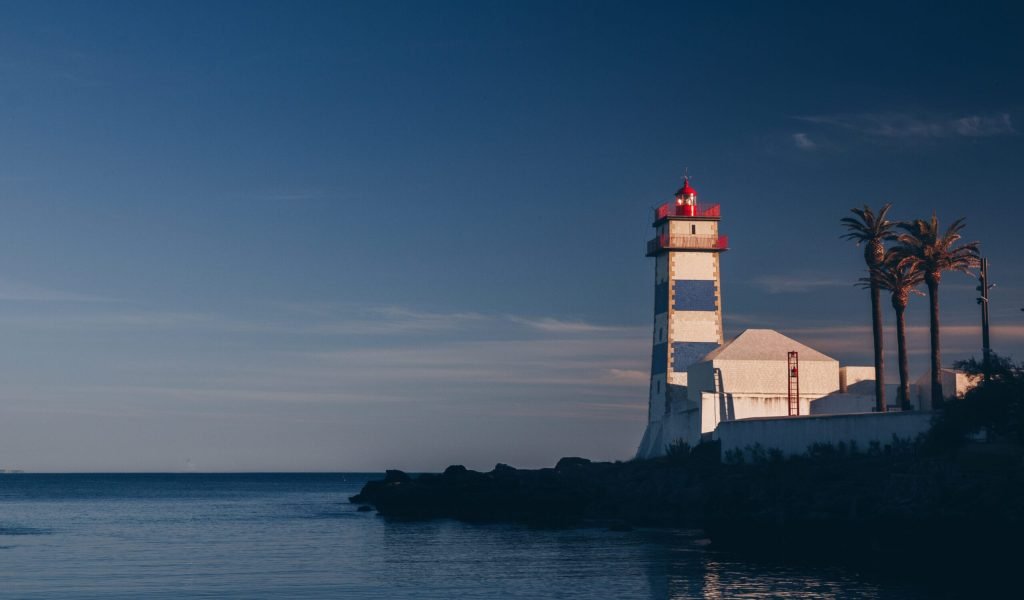 A beautiful lighthouse near the shore in Cascais, Portugal